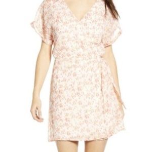 All in Favor Simone Wrap Dress in Multi Animal Pattern. Size S